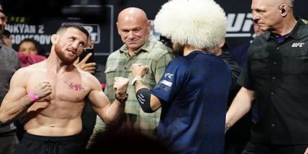 عمر نورمحمدوف يصارع الجورجي ميراب دفاليشفيلي على لقب بطل (UFC)