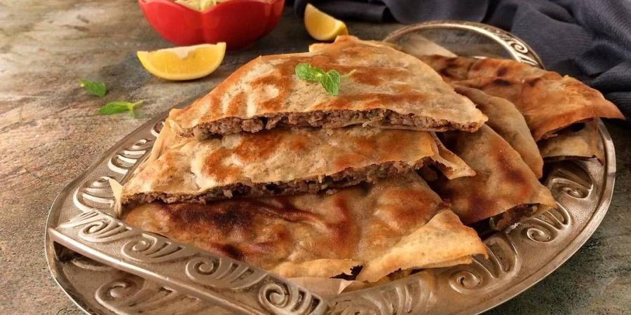 بخطوات سهلة وسريعة.. طريقة عمل حواوشي "الطاسة"